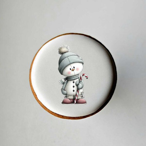 "Besmegenis su saldainiu" dekoruotas sausainis