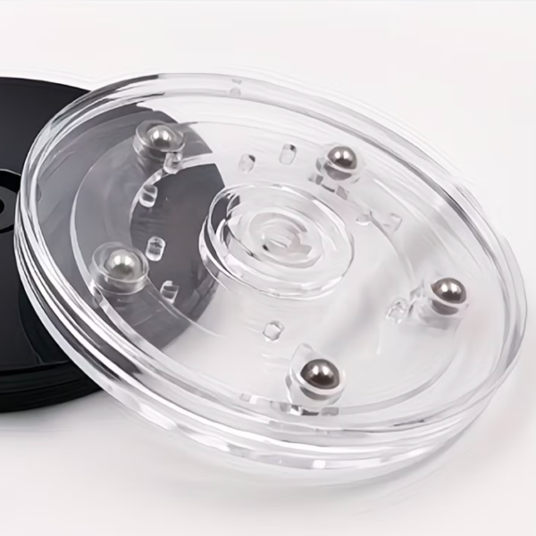 Besisukantis permatomas padėkliukas